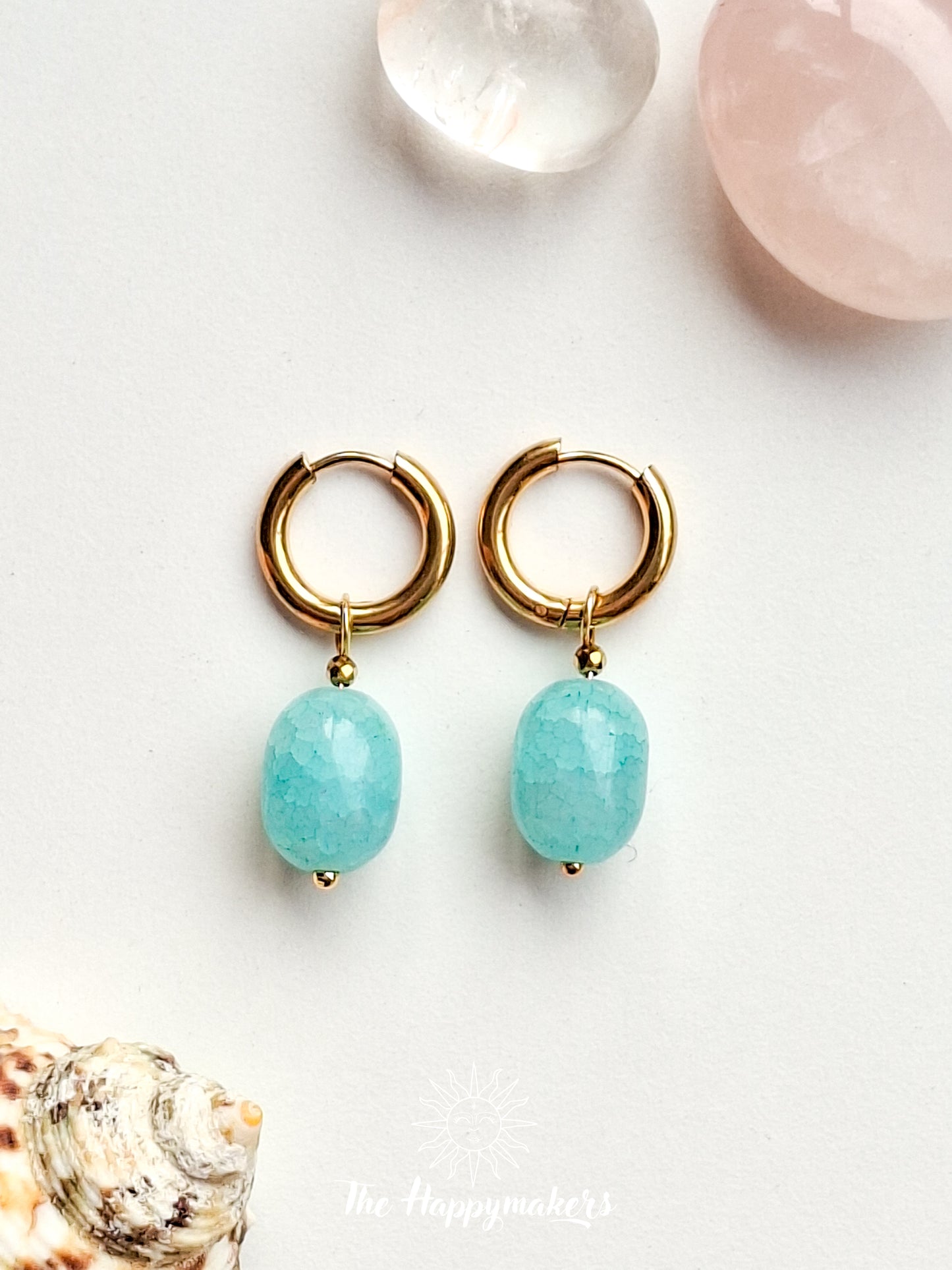 Oorbellen van grote glaskralen