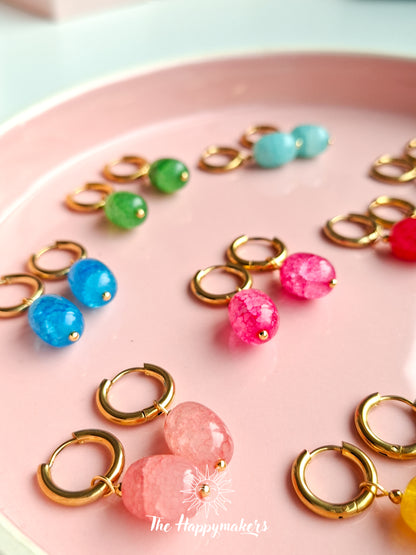 Oorbellen van grote glaskralen