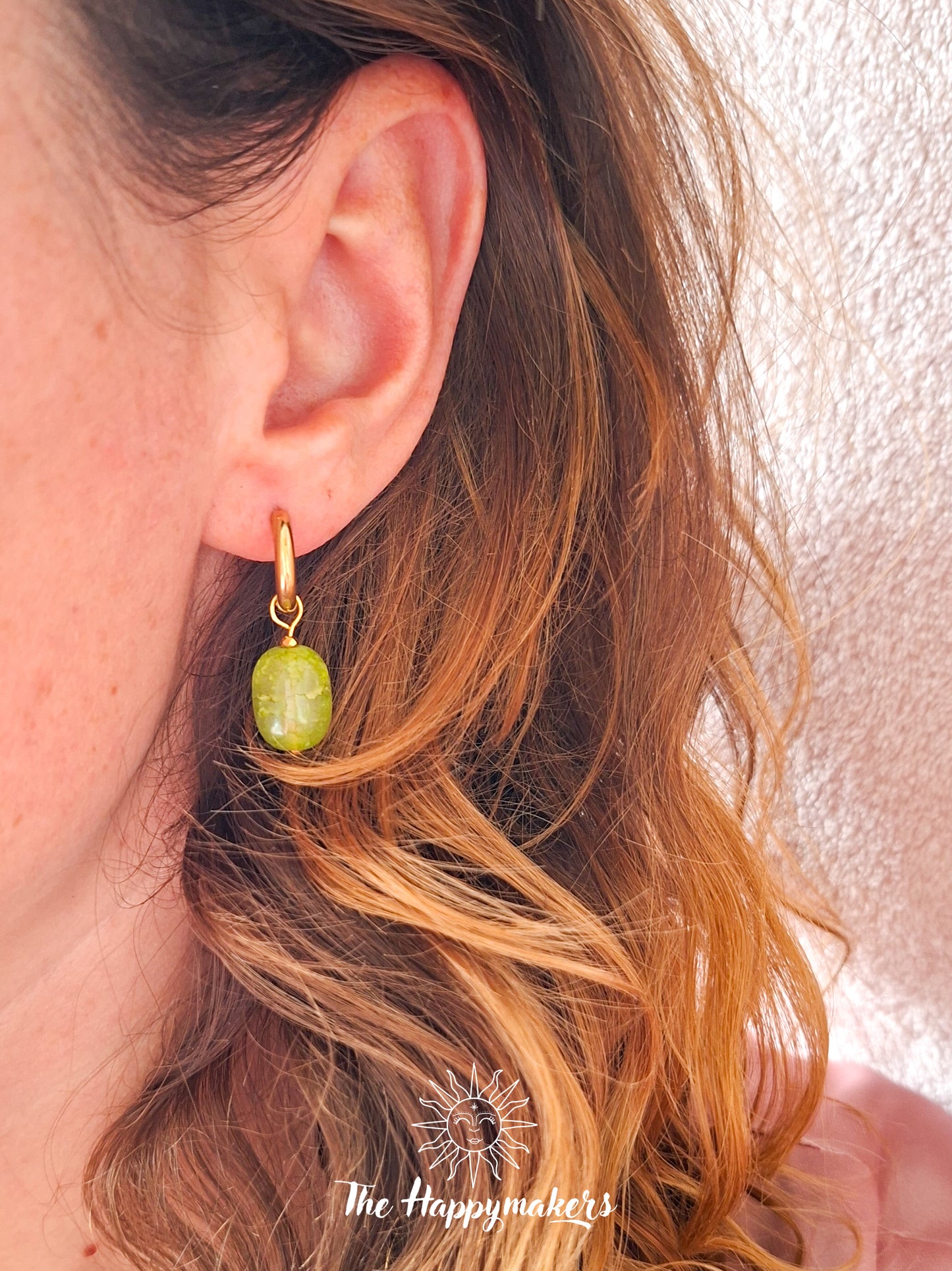 Oorbellen van grote glaskralen