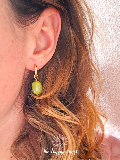 Oorbellen van grote glaskralen