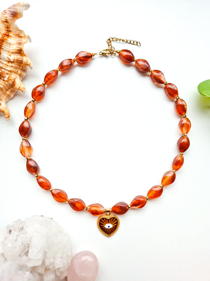 Grote kralen ketting met bedel