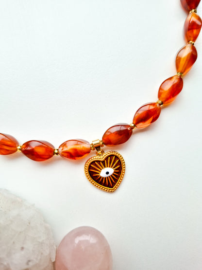 Grote kralen ketting met bedel